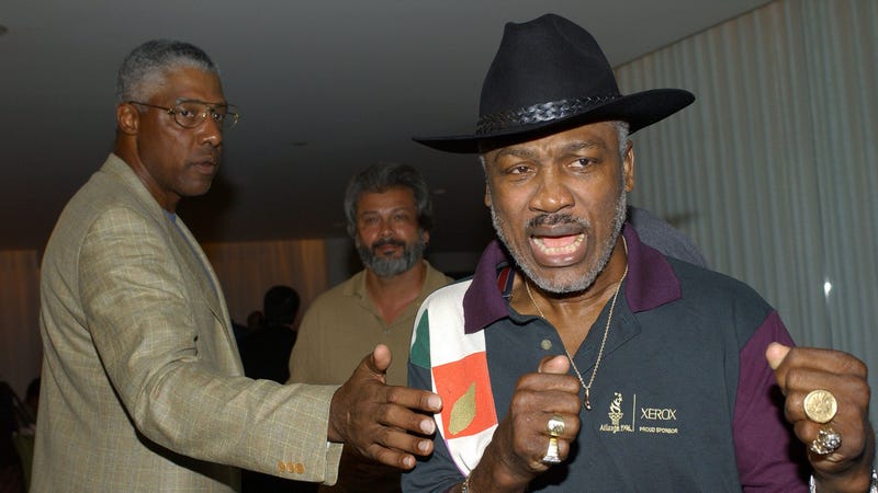 Julius Erving and Joe Frazier