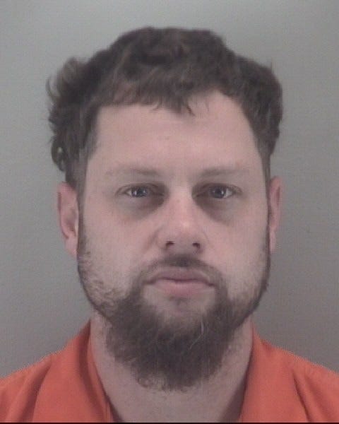 Richmond Police arrest man for racist graffiti sprayed on a West Broad business wall. (Photo Credit: Richmond Police)