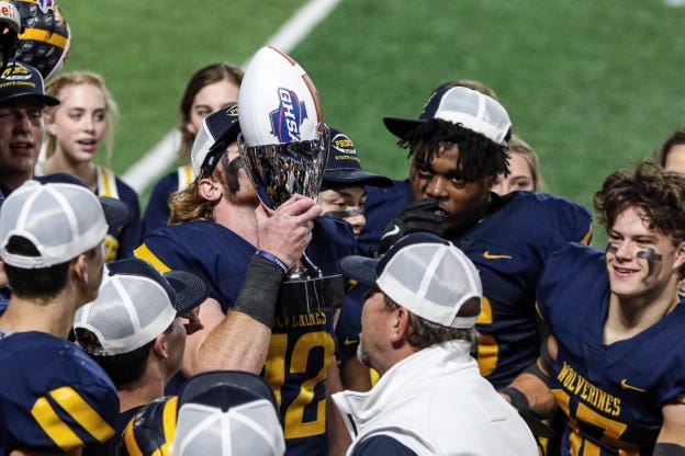 Brock Vandagriff had a big kiss for that GHSA state championship trophy on Monday night.