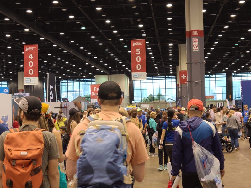 Expo for runners with crowds, booths