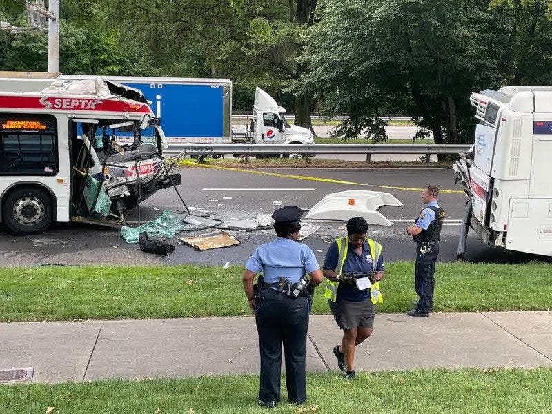 One person was killed and more than a dozen were injured Friday after a SEPTA bus rear-ended another on Roosevelt Boulevard, Philadelphia police said.