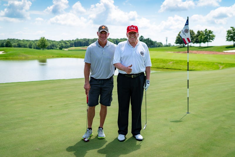 President Donald J. Trump poses for a photo with football legend Brett Favre at Trump National Golf Club in Bedminster Saturday, July 25, 2020, in Bedminster, N.J. Official White House Photo by Tia Dufour