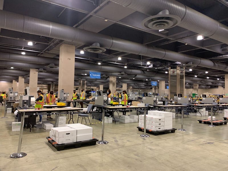 Mail-in ballots are being tallied in the Pennsylvania Convention Center.