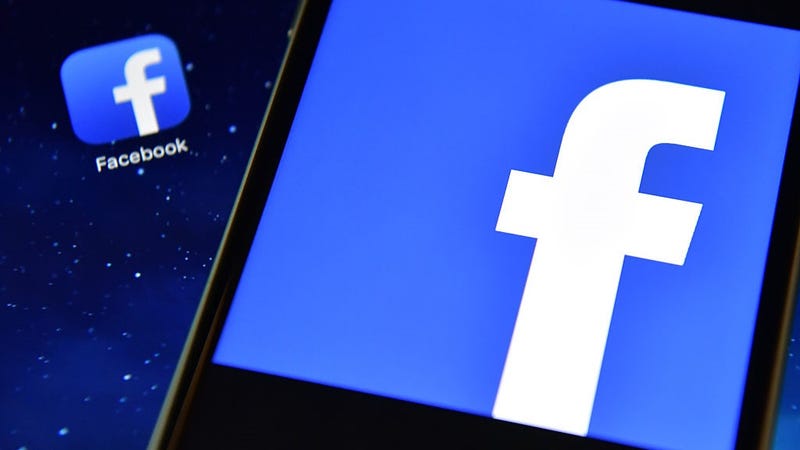 The Facebook app logo is displayed on an iPad next to a picture of the Facebook logo on an iPhone on August 3, 2016 in London, England.
