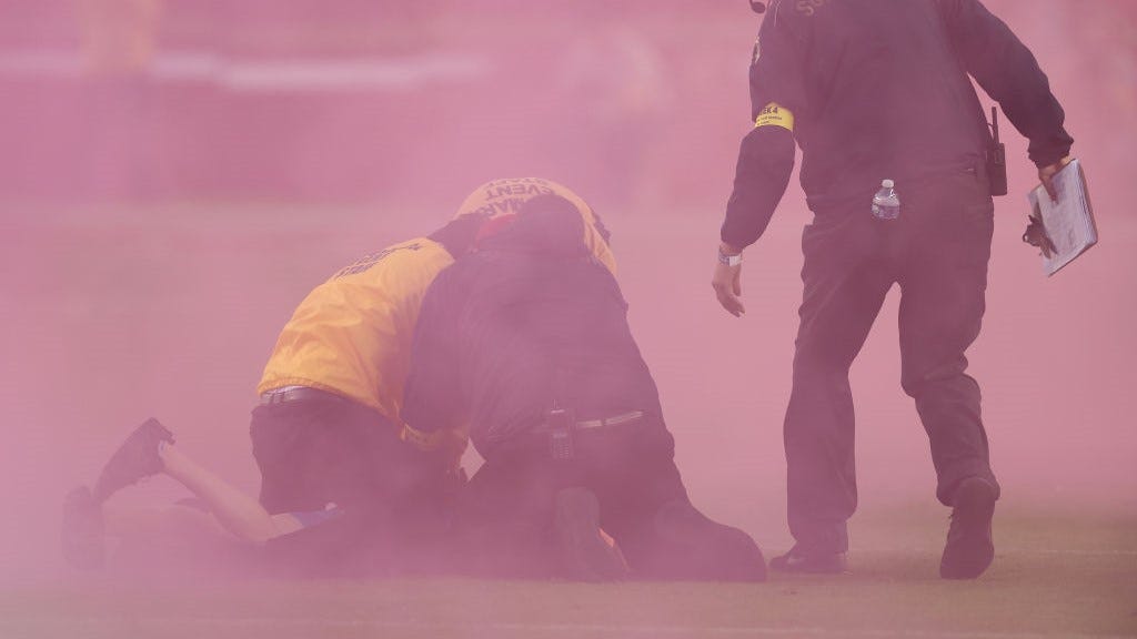 WATCH: Bobby Wagner trucks fan with flare on field during MNF