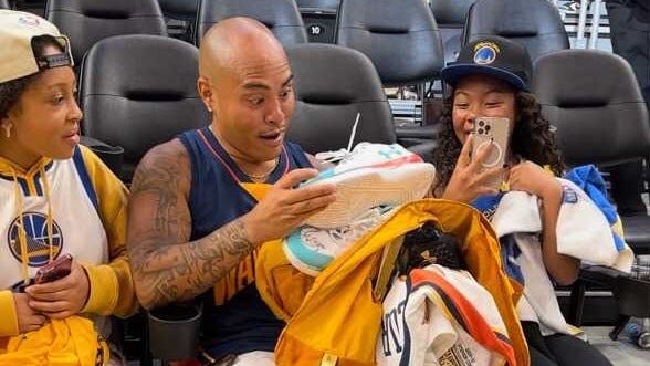 Steph Curry gives Game 2 shoes to viral Warriors super fan Christian Gamboa