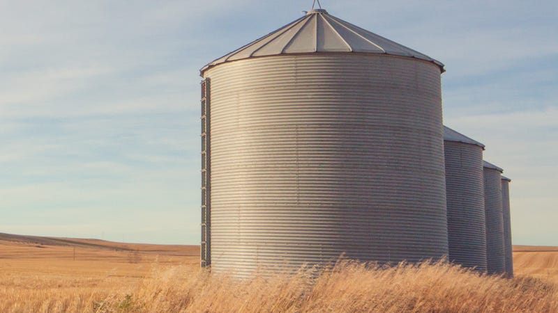 Autumn landscape of grain silos in a farmer's field