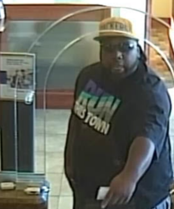 Surveillance snapshot of robbery suspect from 12-31-19