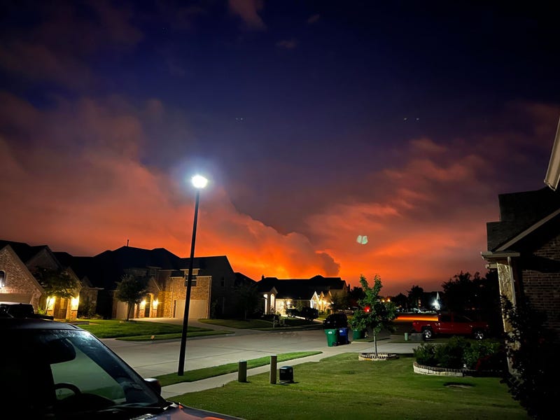 Smoke from a fire burning in Fate, Texas on Tuesday, Aug. 30, 2022.