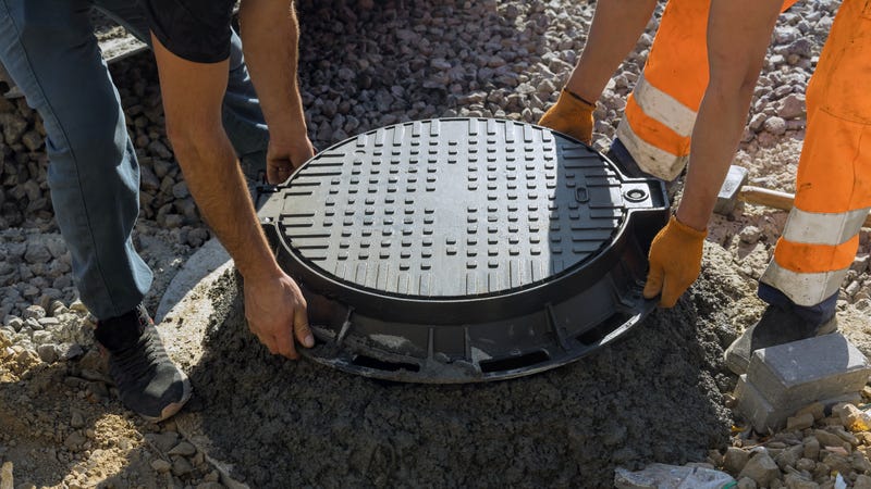 Utility hole cover