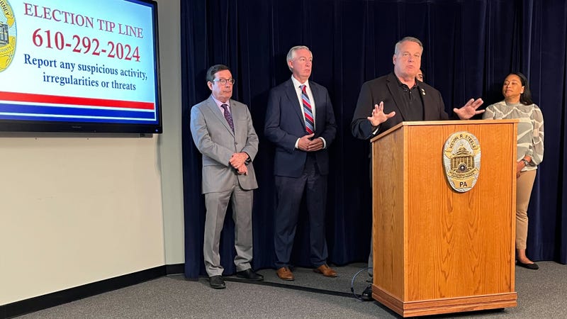 From left: First Assistant District Attorney Ed McCann, D.A. Kevin Steele, County Commissioner Tom DiBello at podium, County Commissioners Neil Makhija and Jamilla Winder.