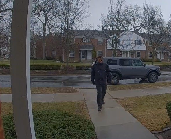 Alleged porch pirate is seen on a doorbell camera.