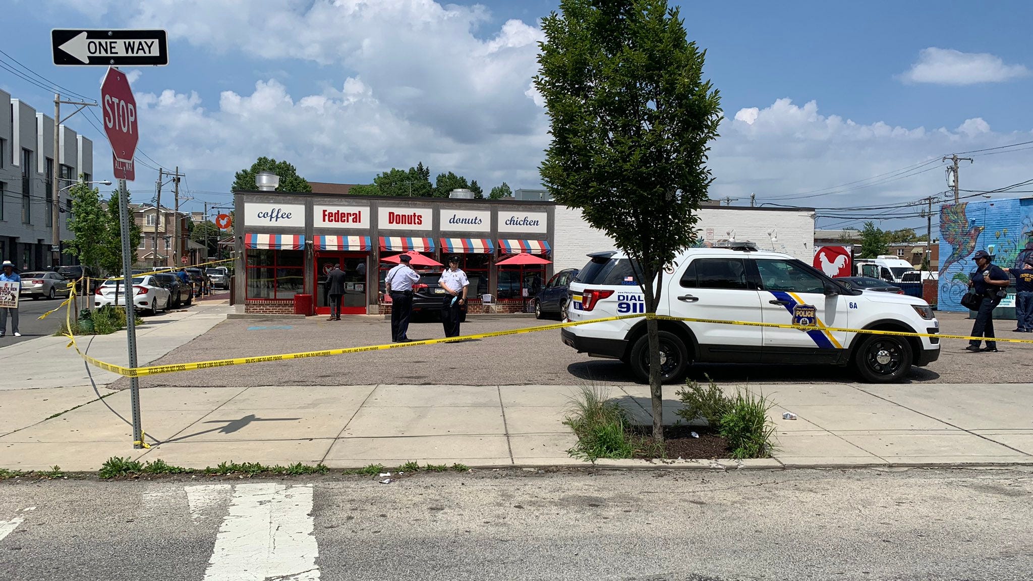 Man, 14-year-old boy shot inside Federal Donuts