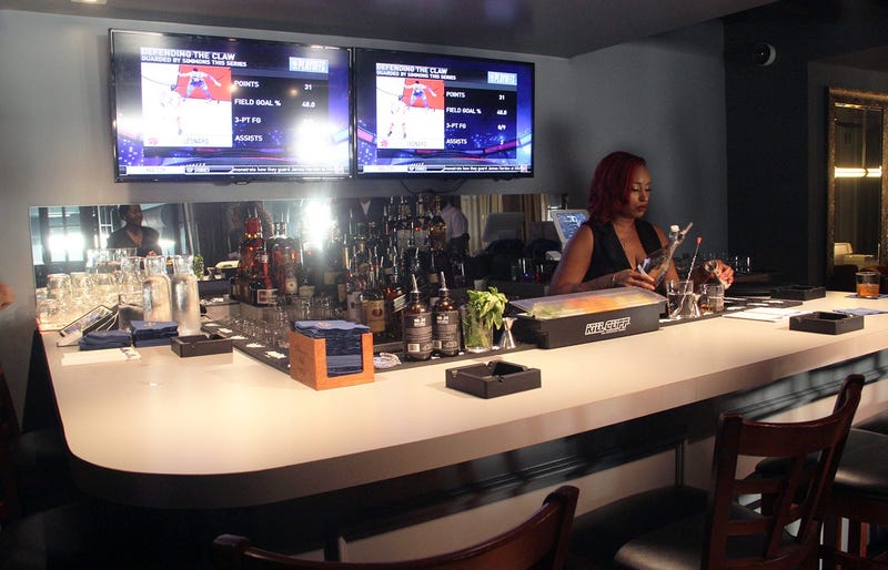 The bar in the upstairs VIP area inside Cam Newton's Fellaship lounge in Atlanta