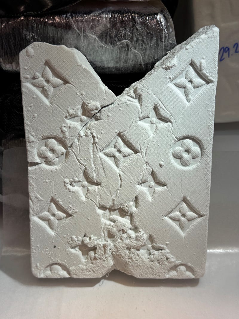 Subsequent DEA laboratory analysis determined the kilogram packages found inside the Honda included 33 kilograms of cocaine, some labelled “MOËT” and “AMIRI,” and over six kilograms of fentanyl, some marked with Louis Vuitton symbols.
