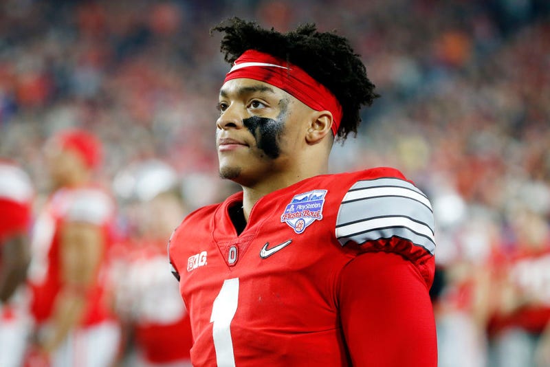 Ohio State QB Justin Fields looks on during a game. 