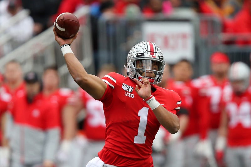 Ohio State Buckeyes quarterback Justin Fields drops to throw during the second quarter against the Penn State Nittany Lions at Ohio Stadium.