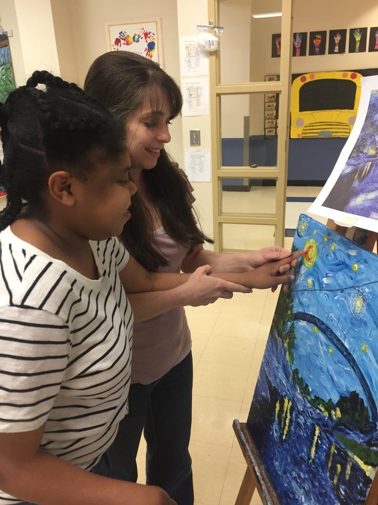 Student finger painting