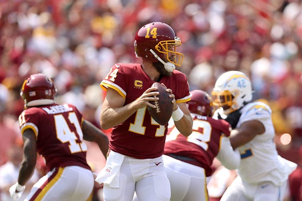 Ryan Fitzpatrick drops back to pass for the Washington Football Team. 