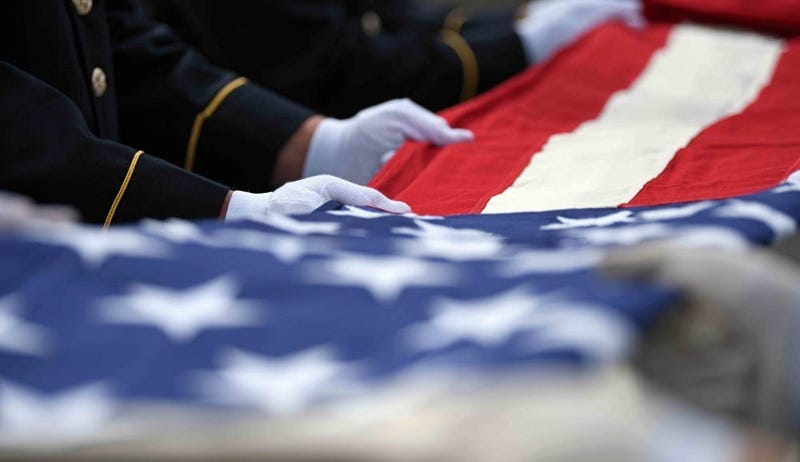 American flag, white glove
