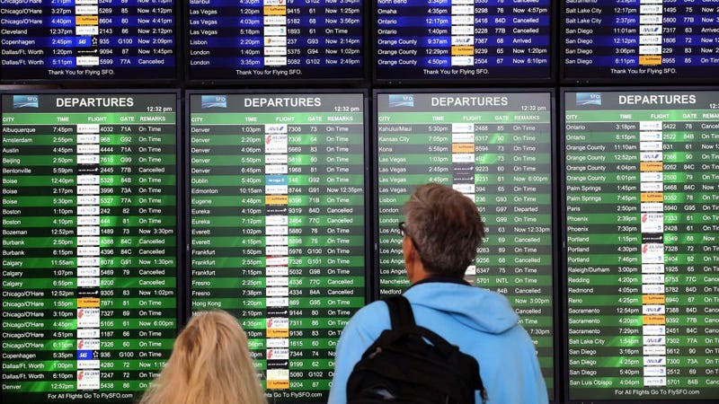 Travelers look at a departures board that displays several cancelled flights at San Francisco International Airport on September 09, 2019 in San Francisco, California. 
