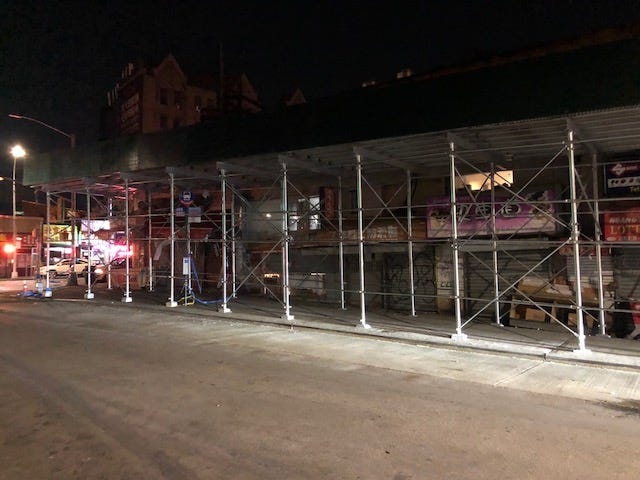 Flushing building where plywood flew off, killing woman