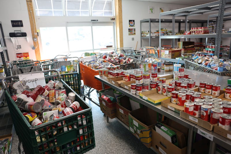 Some of you listening to this radio station heard a local food pantry's call for help, an urgent message echoing the fear of bare reserve shelves and a deepening food shortage. Now, almost a month later, the picture at the Gateway Food Pantry in Arnold looks dramatically different thanks to a generous community response. When we first visited the pantry, it was on a busy distribution day. Vehicles lined up around the building as volunteers rolled carts to load food for the nearly 250 families the pantry serves weekly, including dozens of Boeing families impacted by a recent strike.