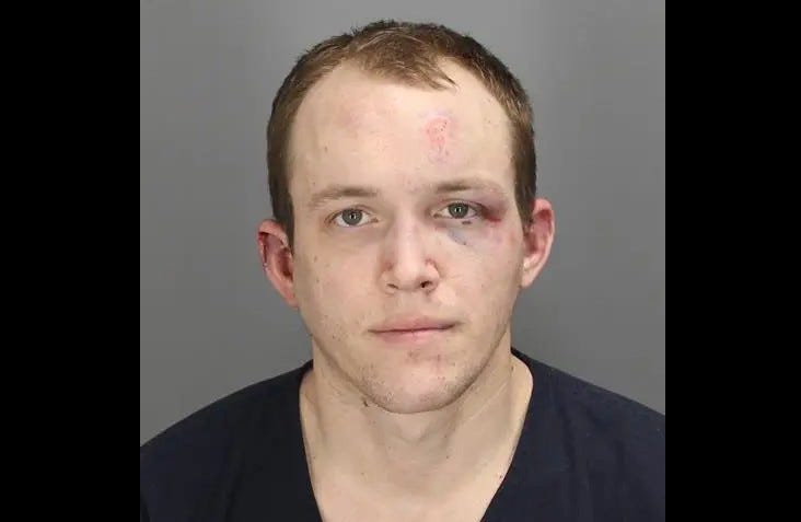 A 27-year-old man has been apprehended by authorities after the Oakland County Sheriff's Office said the man feigned for help from two deputies before allegedly attacking them on Wednesday morning.