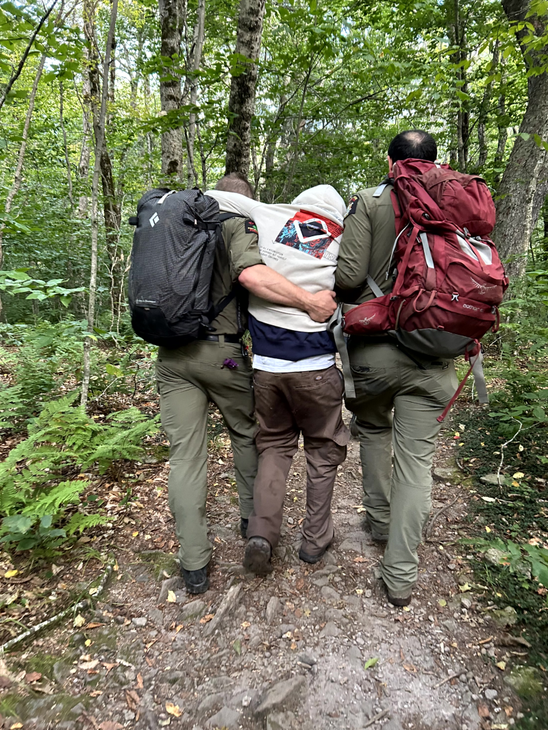 Forest rangers descended into the wilderness and located the group at dusk