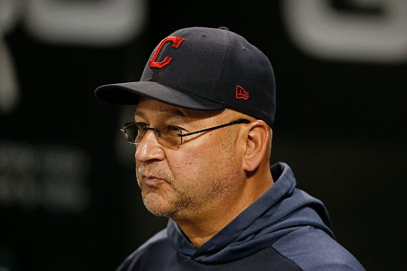 Terry Francona looks on from the Indians' dugout 