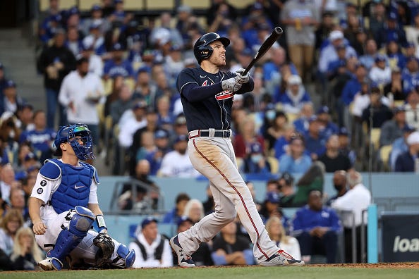 Freddie Freeman watches after blasting a deep drive against the Dodgers. 