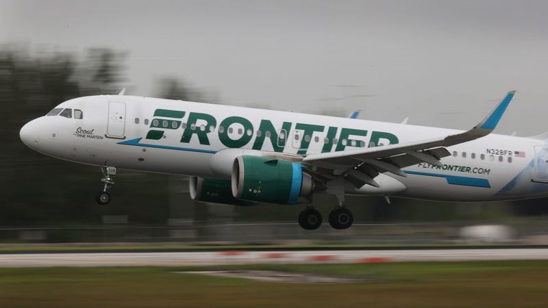 A Frontier airlines plane lands at the Miami International Airport on June 16, 2021 in Miami, Florida. 