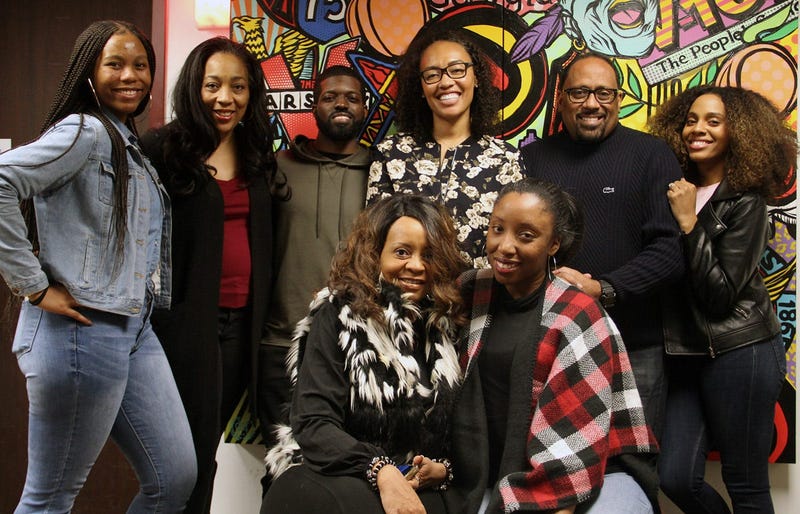 The producers, news, traffic and on-air talent of V-103's The Morning Culture