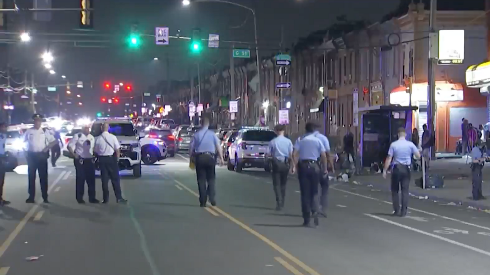 Separate shootings within minutes and a block of each other wound 2, including 15-year-old girl