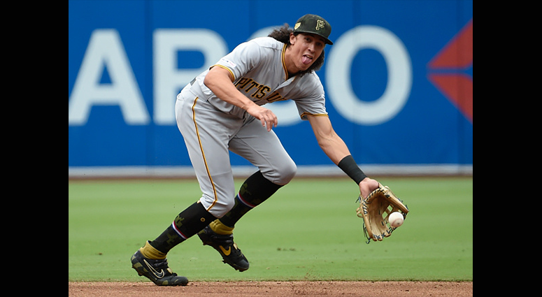 MAY 19: Cole Tucker #3 of the Pittsburgh Pirates makes the stop on a ball off the bat of Greg Garcia of the San Diego Padres in the first inning at Petco Park May 19, 2019 in San Diego, California. Tucker got the out at first base. (Photo by Denis Poroy/G