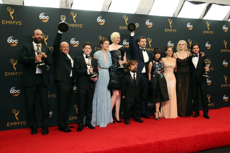 The cast of Game of Thrones pose with their Awards for Outstanding Drama Series in the photo room during 68th Emmy Awards at the Microsoft Theater. 