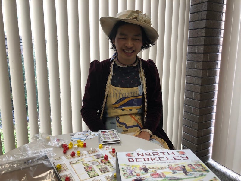 Alfred Twu, a former Berkeley city council candidate, shows off his North Berkeley board game.