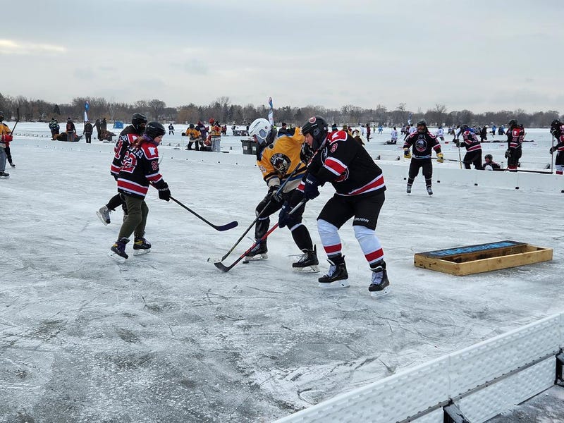 Playing pond hockey on newly frozen ice in Minneapolis