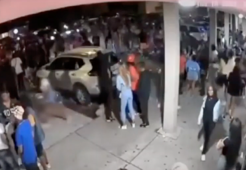crowd in parking garage