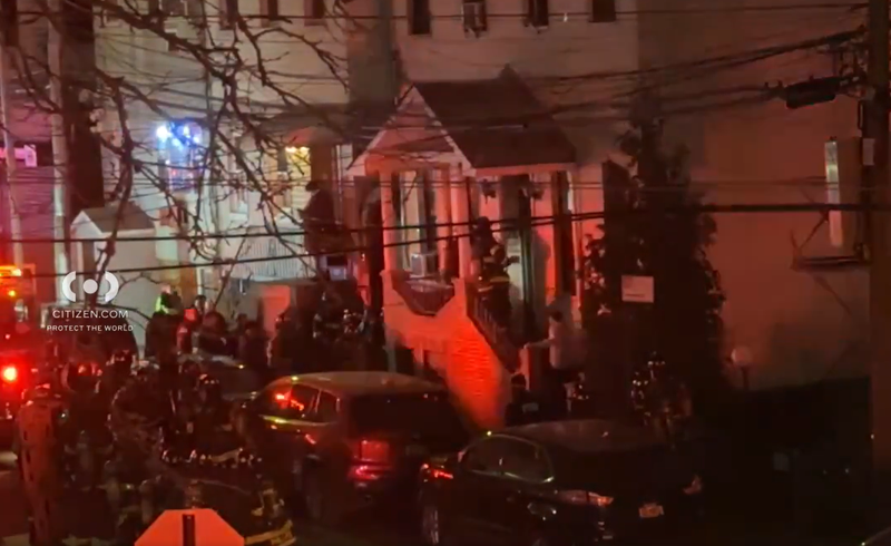 Firefighters responded to the building in Maspeth, Queens just after 11:30 p.m. on Friday.