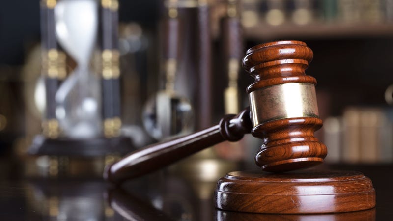 Gavel and scale on the judge desk