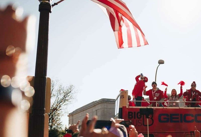 Grant Paulsen and Danny Rouhier of the "Grant & Danny Show" take part in the Washington Nationals victory parade in Washington, D.C. on Saturday, November 1.