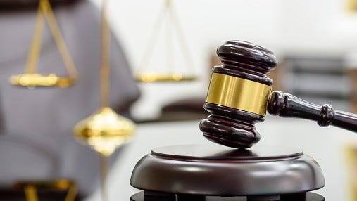 FILE: Wooden judge gavel or a wooden hammer used by a judge.