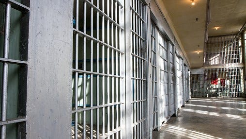 FILE: The hallway of a jail.