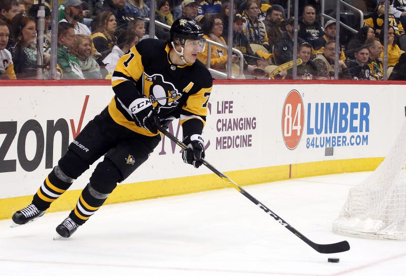 Pittsburgh Penguins center Evgeni Malkin (71) skates with the puck against the St. Louis Blues during the third period at PPG PAINTS Arena.