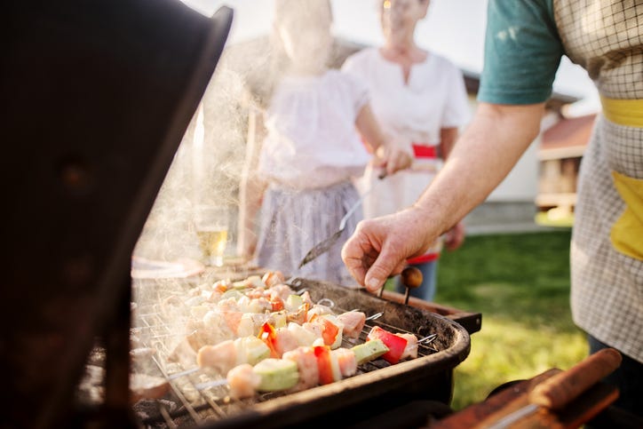 Grilling food.