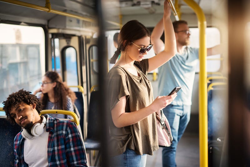 Urban citizens ride city bus