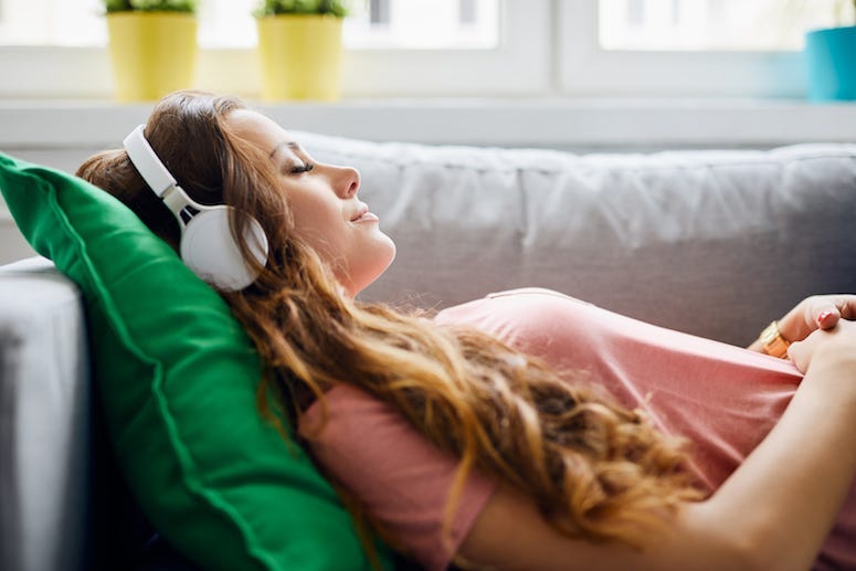 Woman, Couch, Sofa, Headphones, Listening to Music, Relaxin