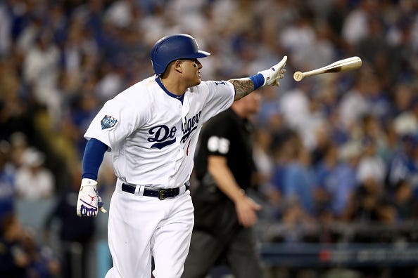 Manny Machado hits a sixth inning single off the wall against the Boston Red Sox