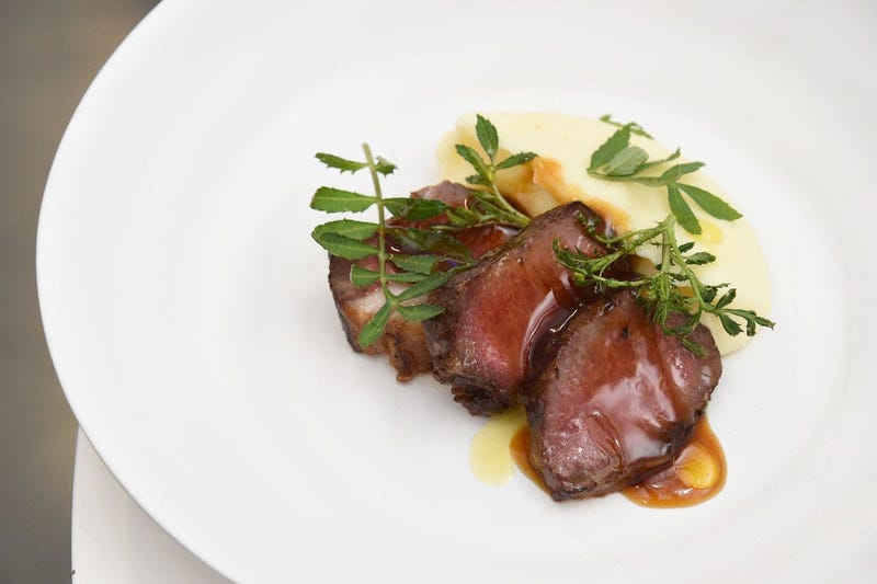 A view of the Roasted New Zealand Lamb by James Beard Award Winning Chef and restaurateur David Chang, during an immersive culinary experience hosted by American Express Travel and David Chang, at Lightbox on November 14, 2018 in New York City.